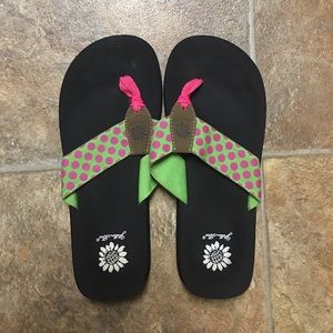 Yellow box flip flops